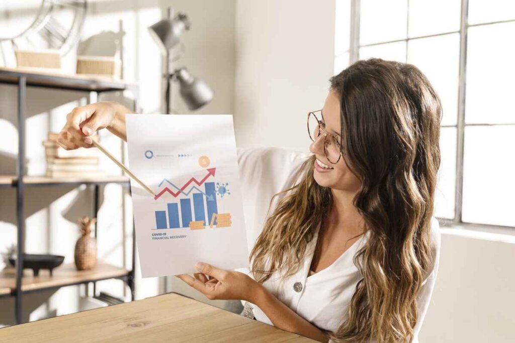 Woman showing growth in occupancy chart