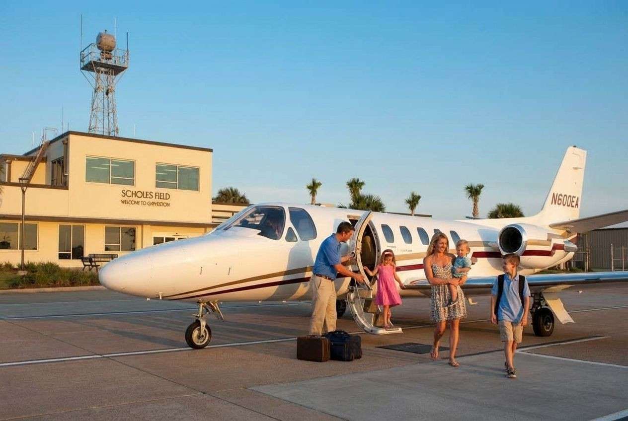 Family arriving into Scholes International Airport