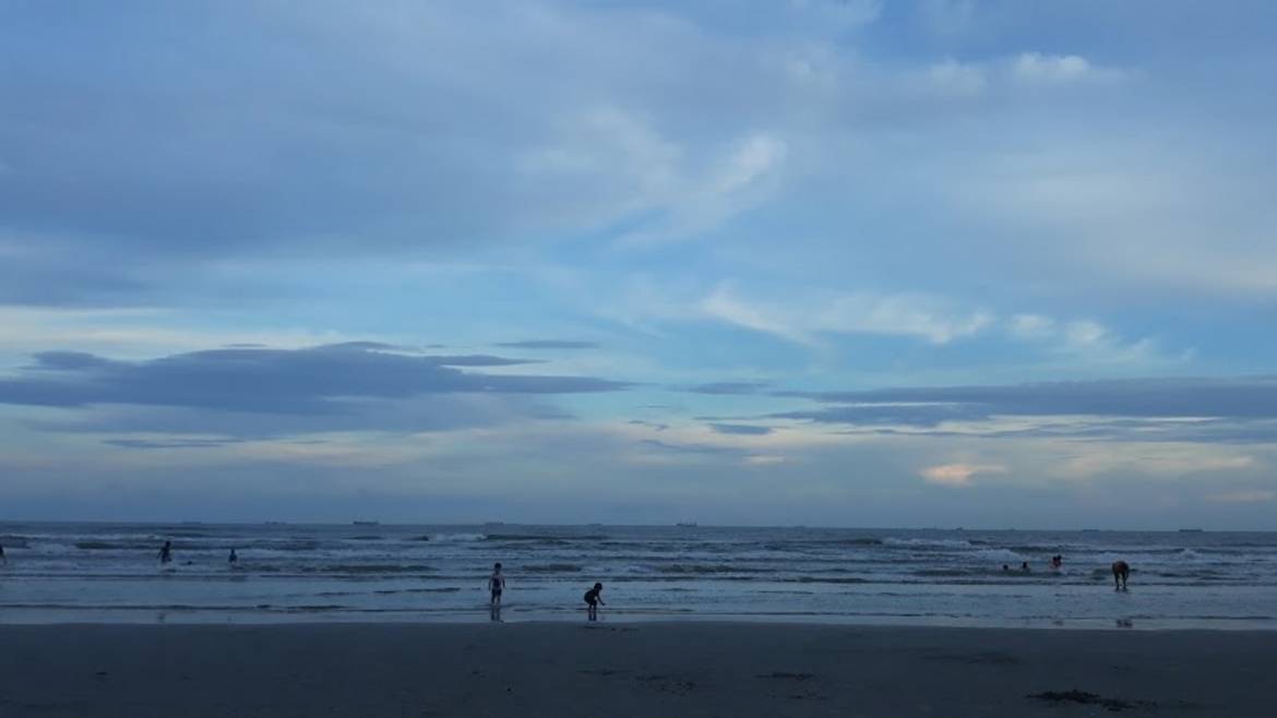 East Beach Galveston with wide sand and pavilion